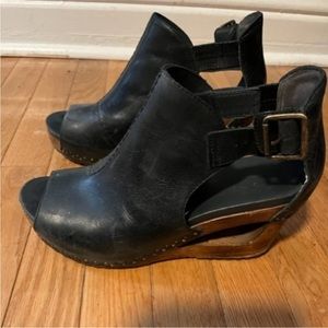 Dansko wood and black leather wedges